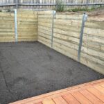 Choosing Between Steel vs Wood in Outdoor Retaining Walls